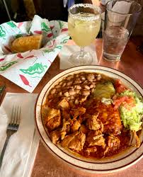 The Shed signature dishes Chicken Enchilada Plate
Posole
Carne Adovada Plate